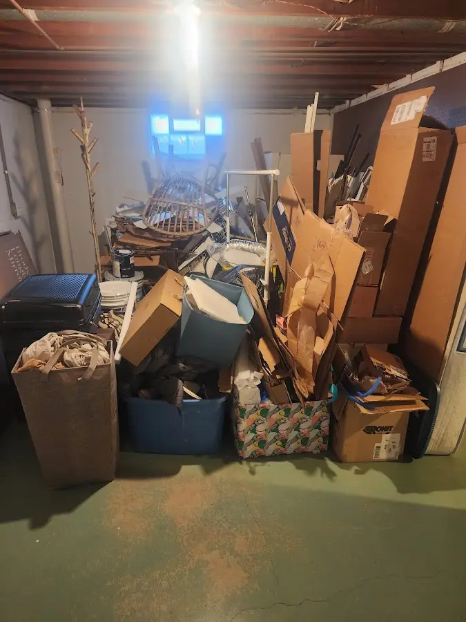 Roll-off dumpster container at job site for 20 Yard Dumpster Rental in Lufkin